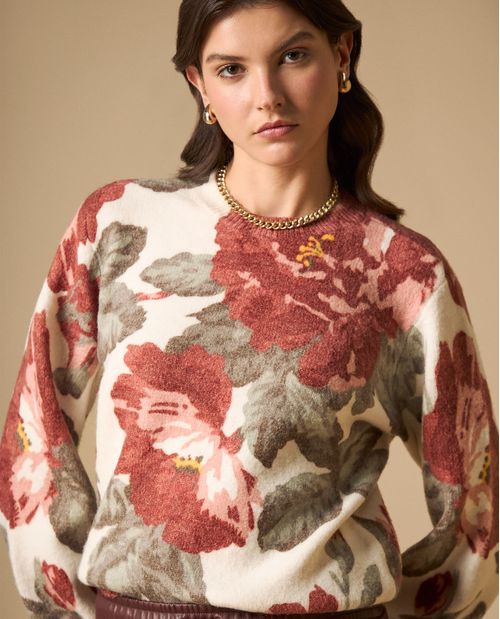 Suéter cuello redondo con estampado floral