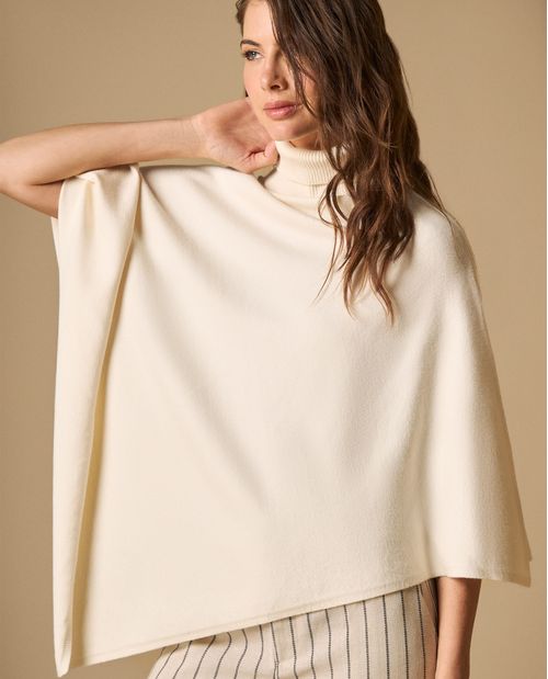Poncho tejido cuello alto asimétrico para mujer